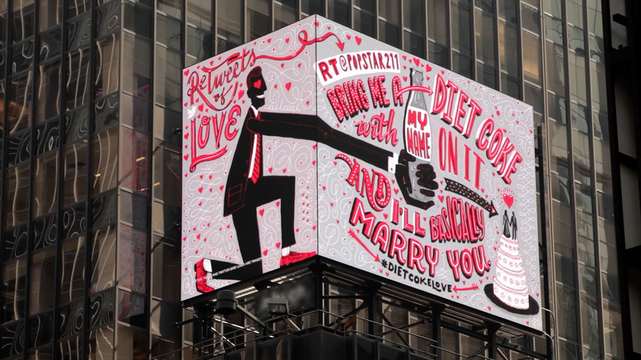 A large billboard with graffiti on it.