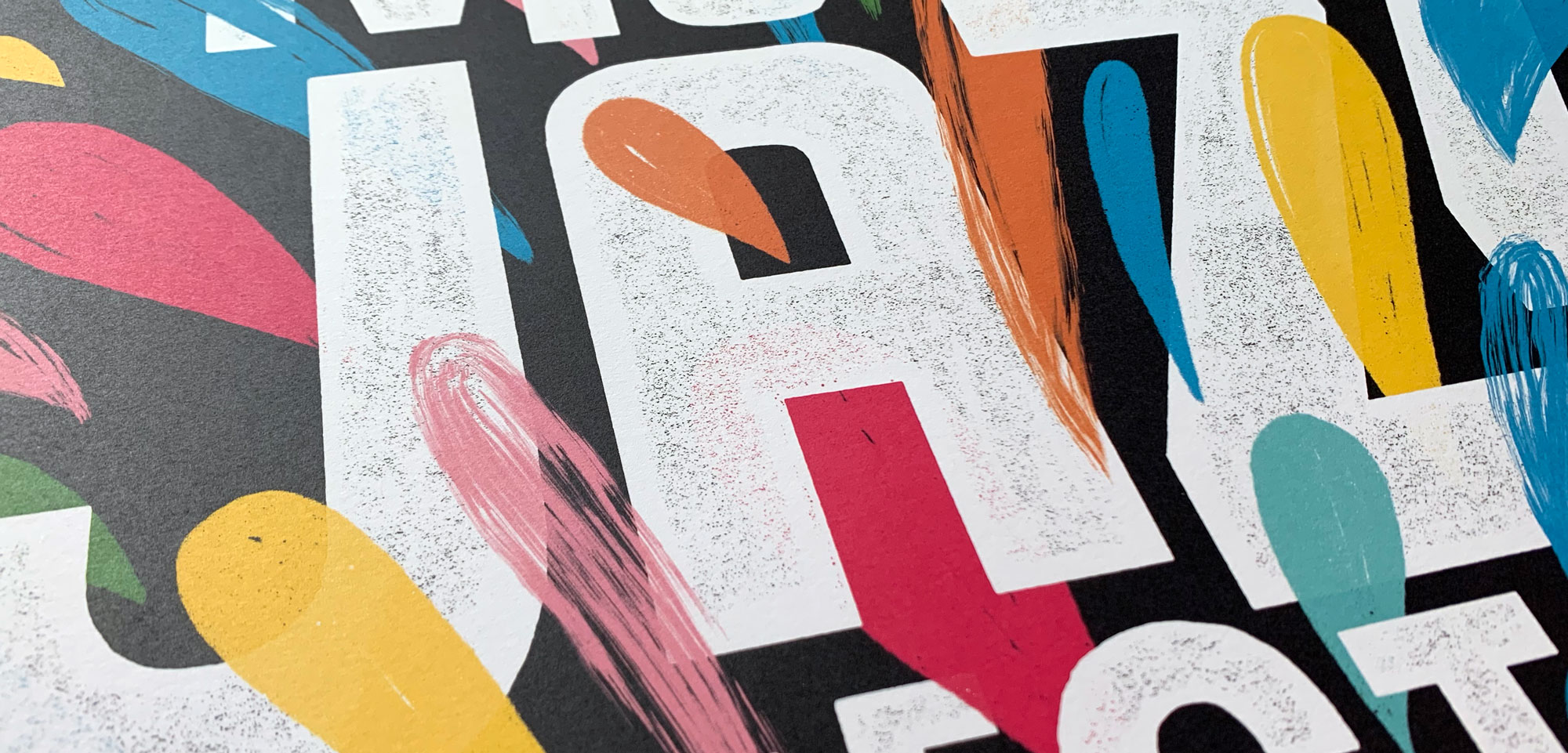 A close up of the letters on a poster